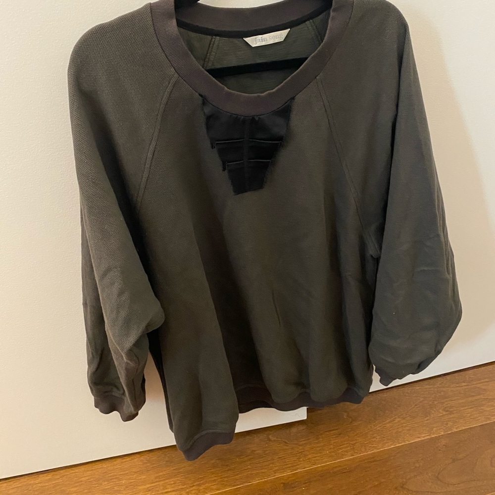 Silk embellishes swearshirt